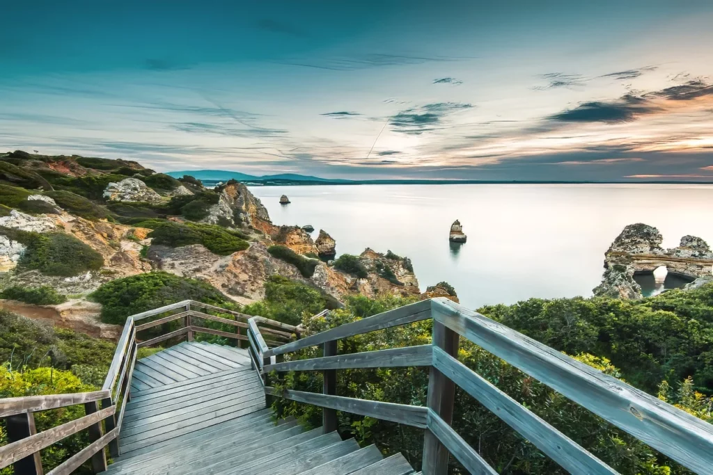 The wooden footbridge walkway to the Praia do Camilo beach in Algarve region, one of Portugal's best beaches.
