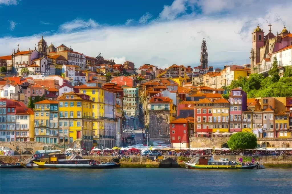 A view of the Porto skyline on the Douro River, one of the highlights in this Portugal travel guide.