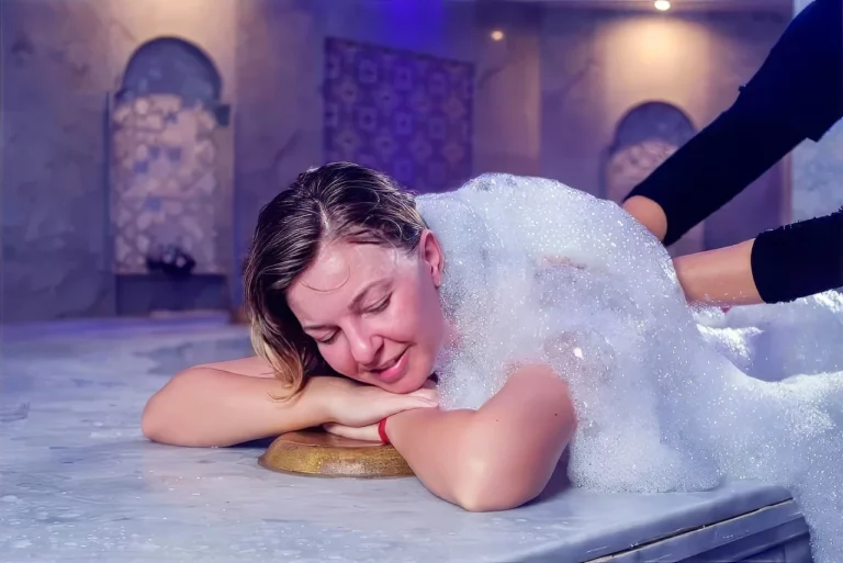 A young woman relaxing in hammam.